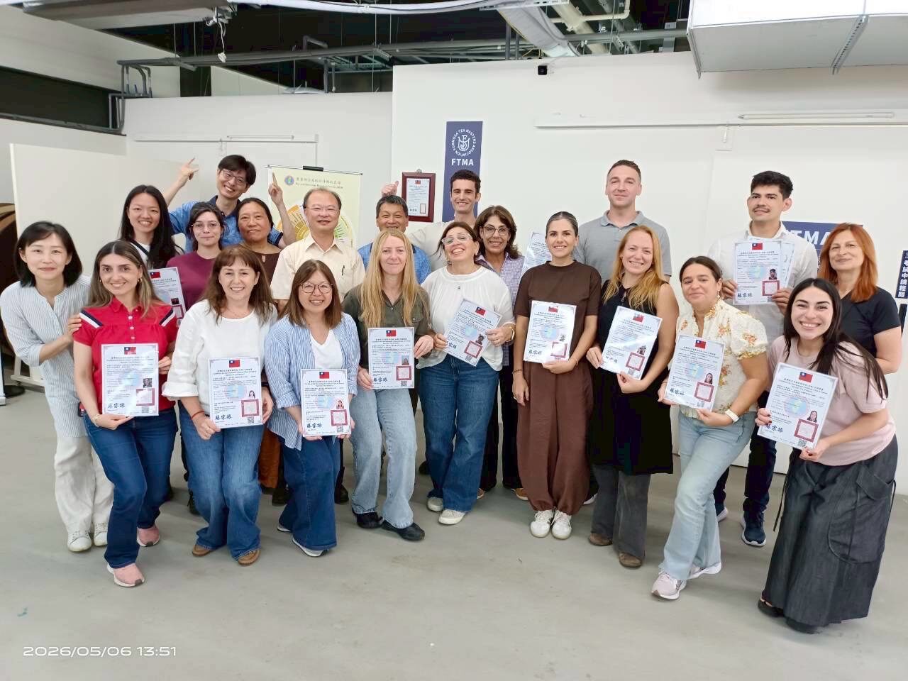 Students showing their certificates
